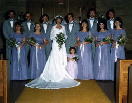 Here is a great example of a 1980s wedding showing the hair and fashion of
